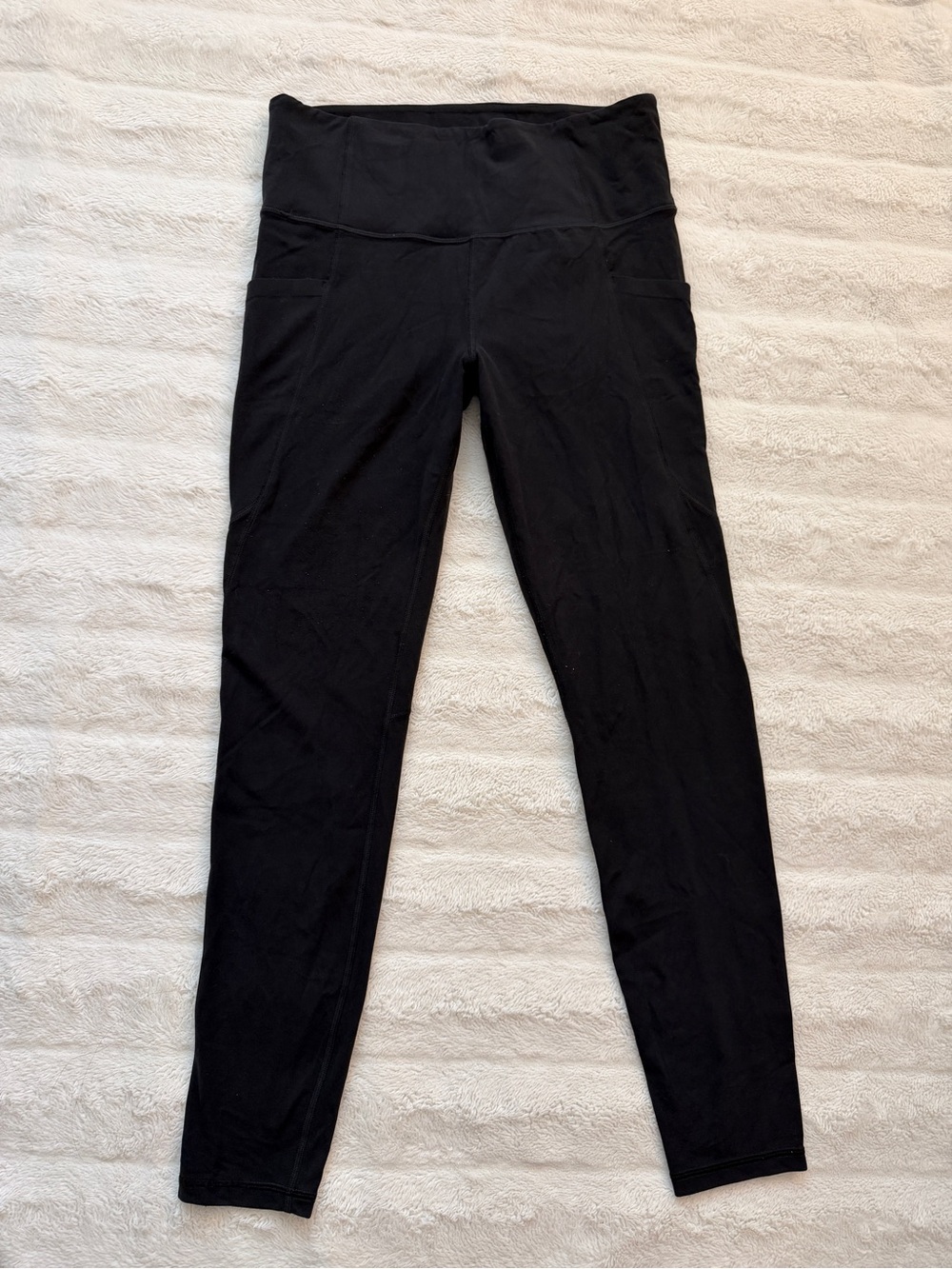 Athleta Stash Pocket Salutation Tight Black